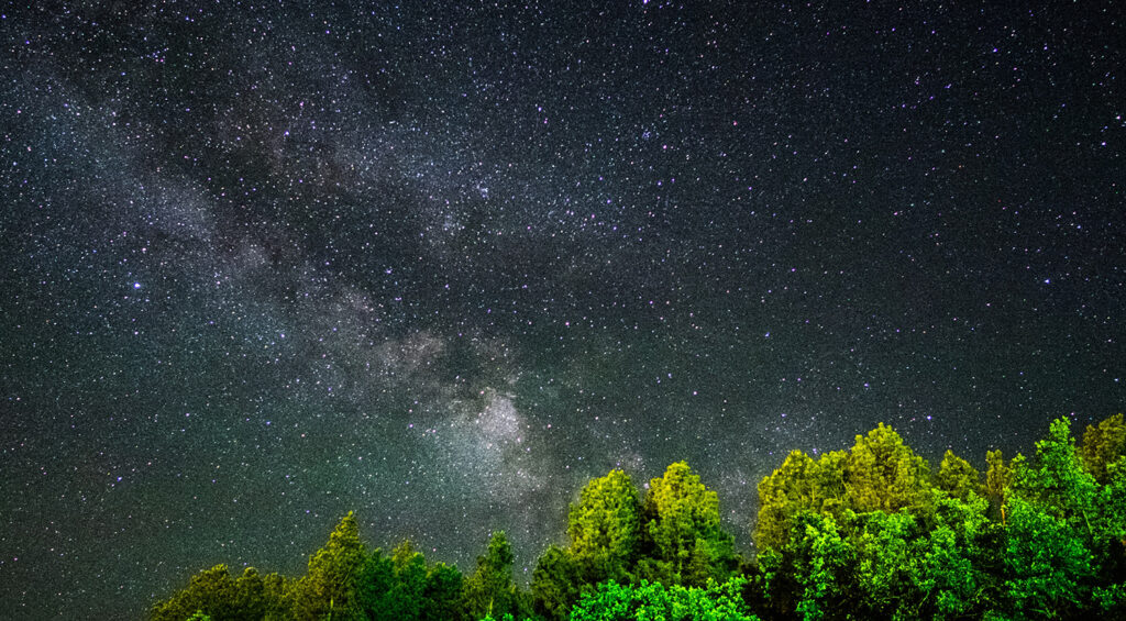 photo of the sky at night showing the milky way