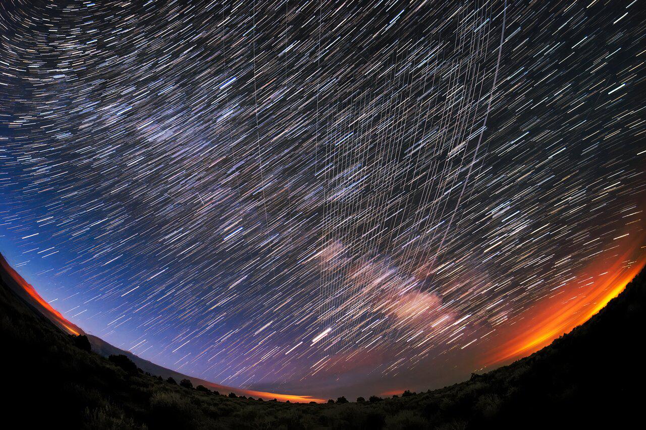 Starlink Satellites pass overhead near Carson National Forest, New Mexico © IAU / M. Lewinsky Creative Commons